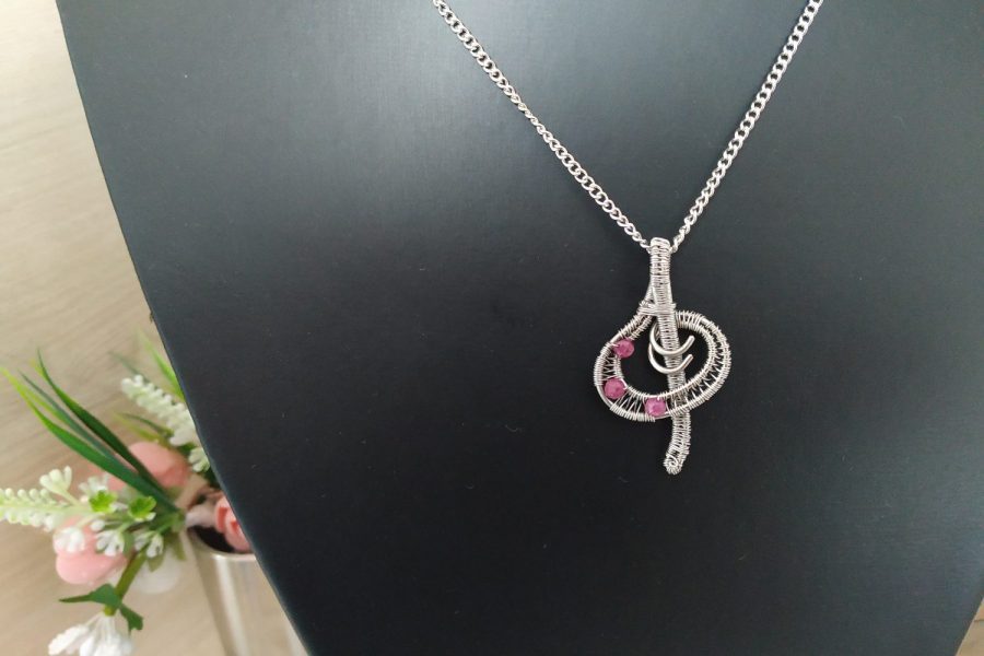 Pendant "Sol key with rubies"